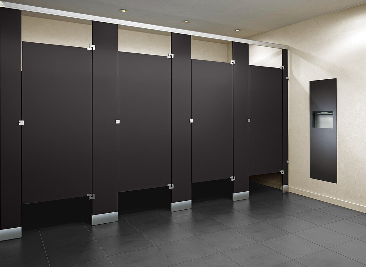Black phenolic color-thru toilet partitions in a commercial restroom