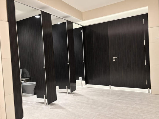 Bobrick Privada floor-to-ceiling toilet compartments installed at Atlantic Aviation Birmingham FBO terminal